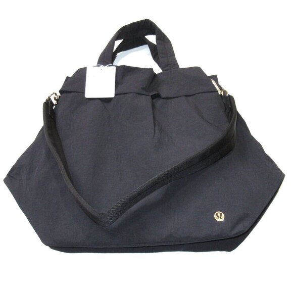lululemon athletica Handbags - NWT Lululemon On My Level Bag 19L in Black Gold Crossbody Strap Tote